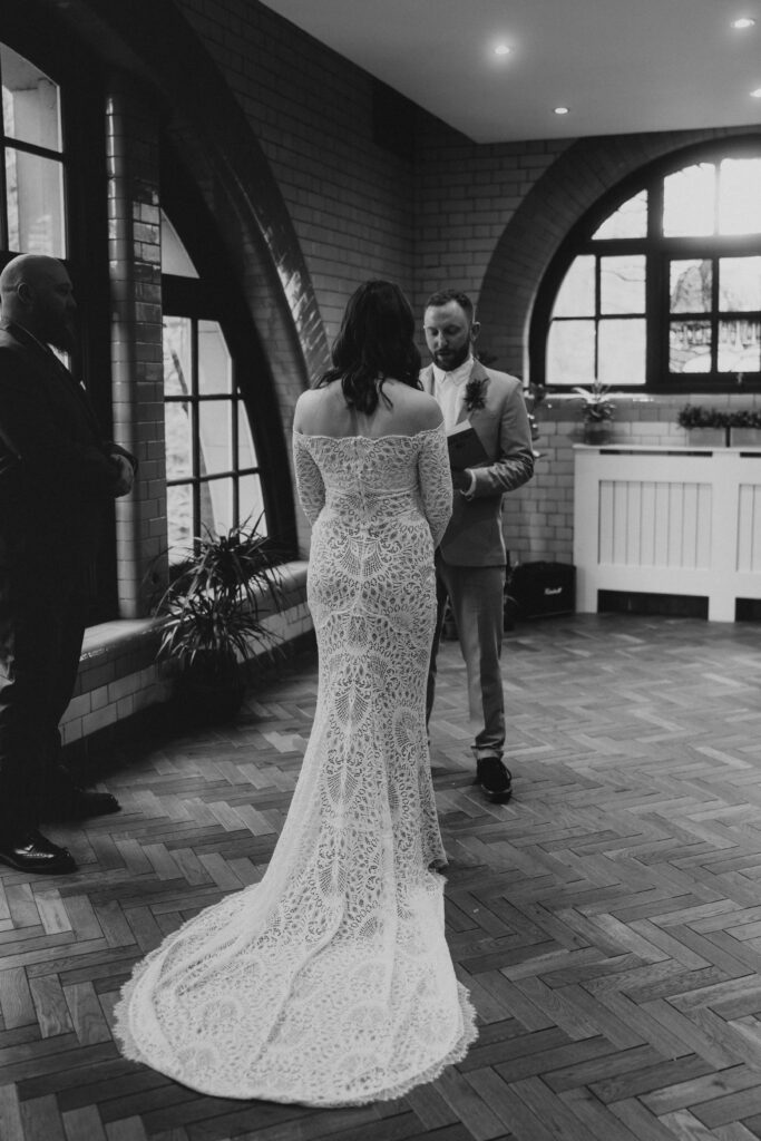 Groom Reading Vows To Bride at Wedding Ceremony at The Pumping House, Ollerton. Wedding Photographer