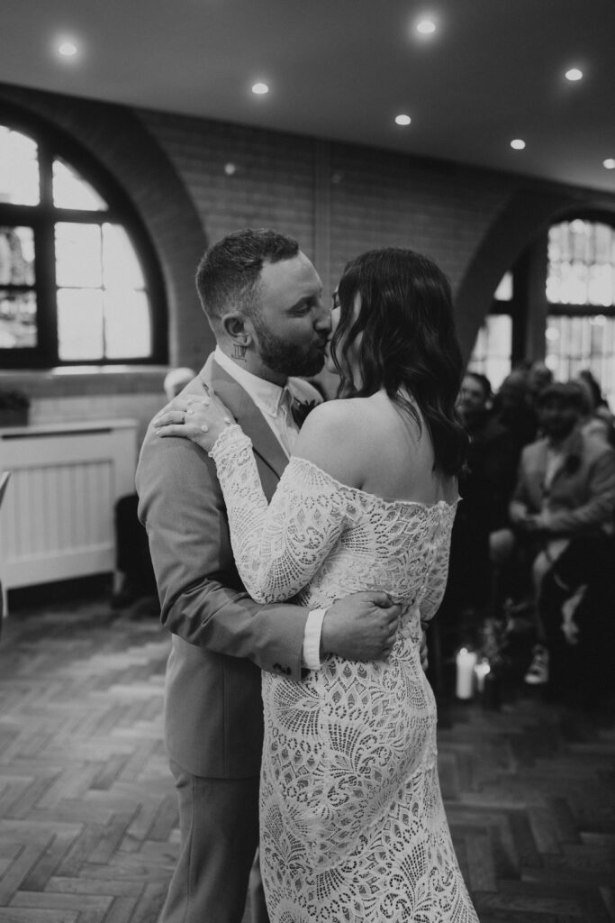 First Kiss Between From and Bride at Wedding Ceremony at The Pumping House, Ollerton. Wedding Photographer