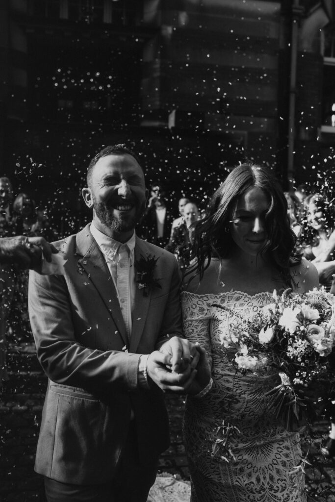 Relaxed Wedding Photographer Capturing Confetti Line Outside Wedding Ceremony at The Pumping House, Ollerton.