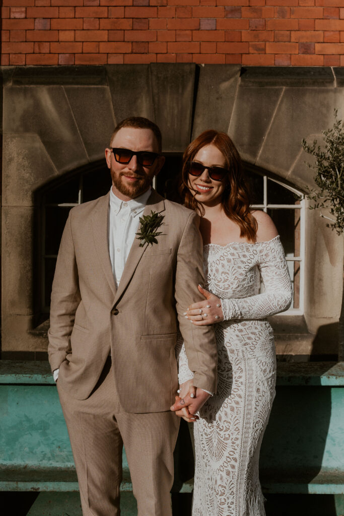 Relaxed Wedding Photographer Capturing Alternative Bride And Groom wearing sunglasses Couple Shoot at The Pumping House, Ollerton.
