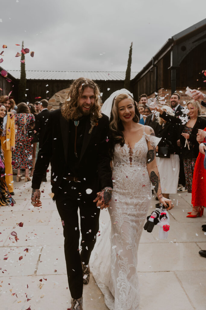 relaxed wedding photographer capturing the fun confetti shots at willow marsh farm