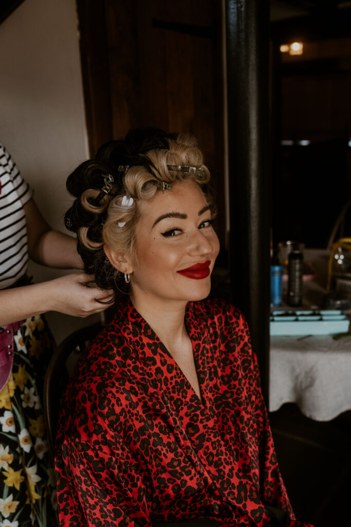 Alternative bride getting ready in the morning at Willow Marsh Farm captured by a relaxed wedding photographer
