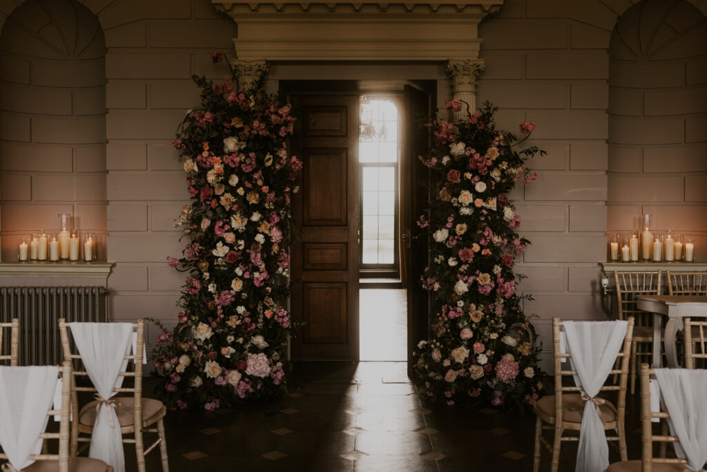 floral pink spring beautiful flower archway at davenport house ceremony 