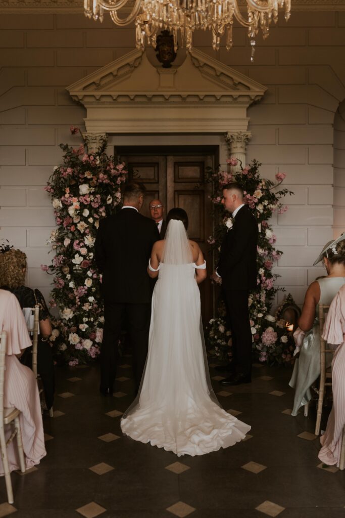 grooms heartfelt reaction to bride walking down the isle with her father at davenport house