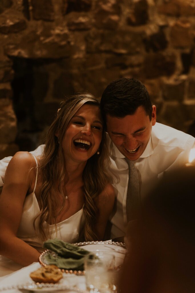 candid wedding photographer capturing natural reactions at the speeches at eden barn