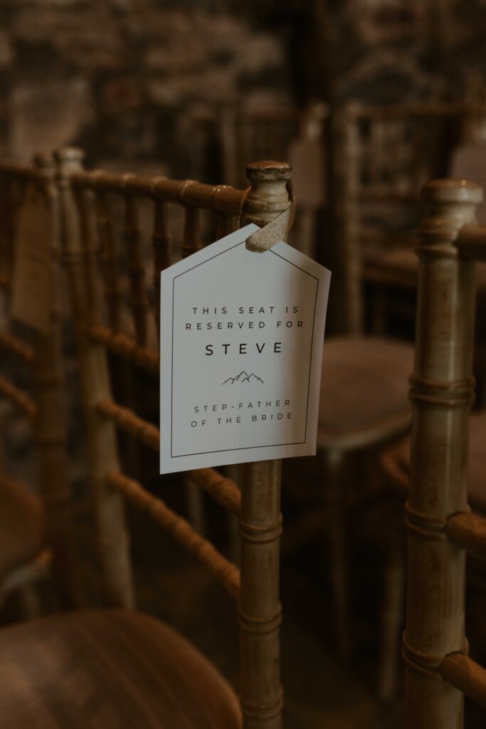 adventurous wedding seat names at the ceremony at Eden barn