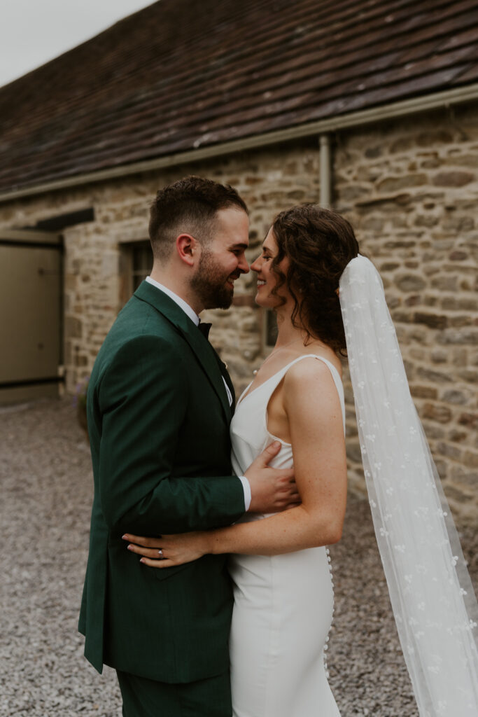 couple shoot in the evening at tithe barn wedding venue 
