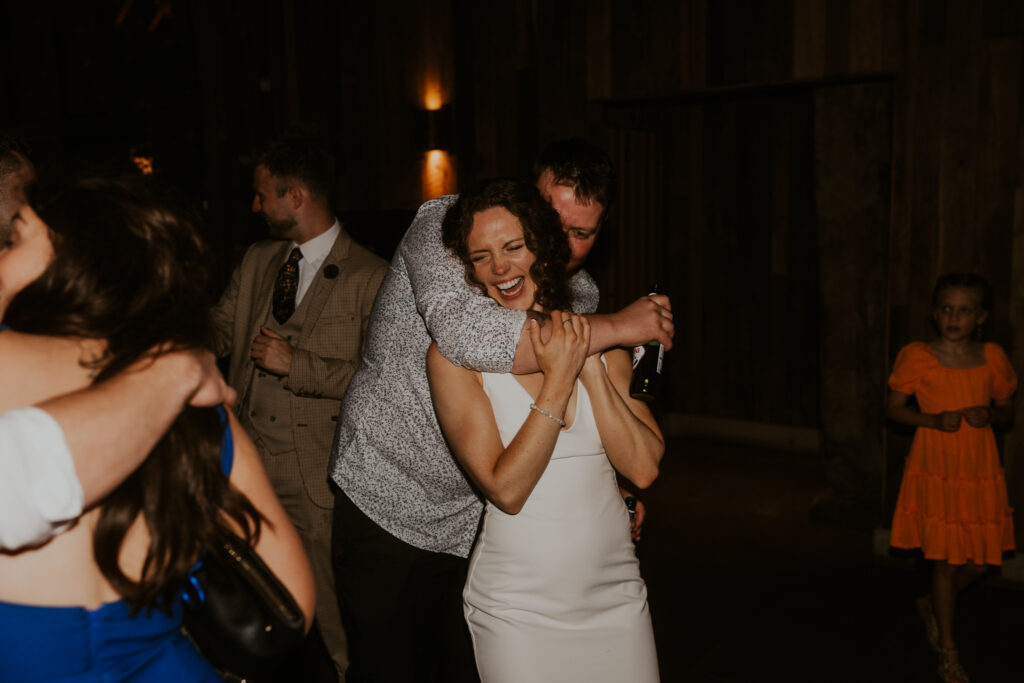relaxed and emotive wedding photographer based in Yorkshire capturing evening celebrations at Tithe Barn 